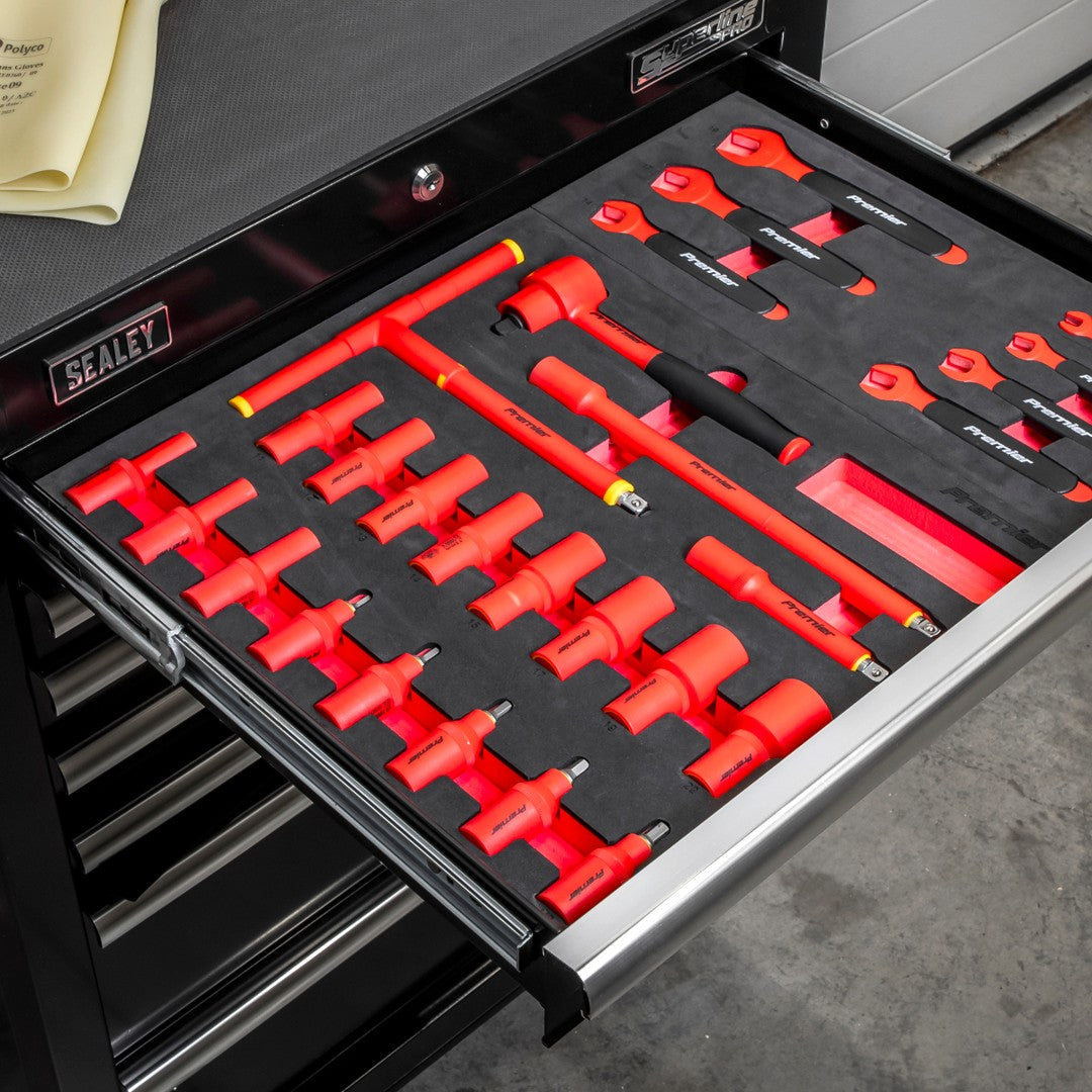 Open drawer of a black Sealey cabinet with insulated VDE sockets and spanners in a red and black foam tray